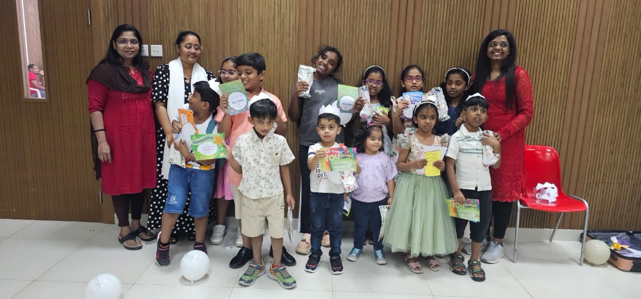 Kids celebrating with prizes at Kids Church Dubai